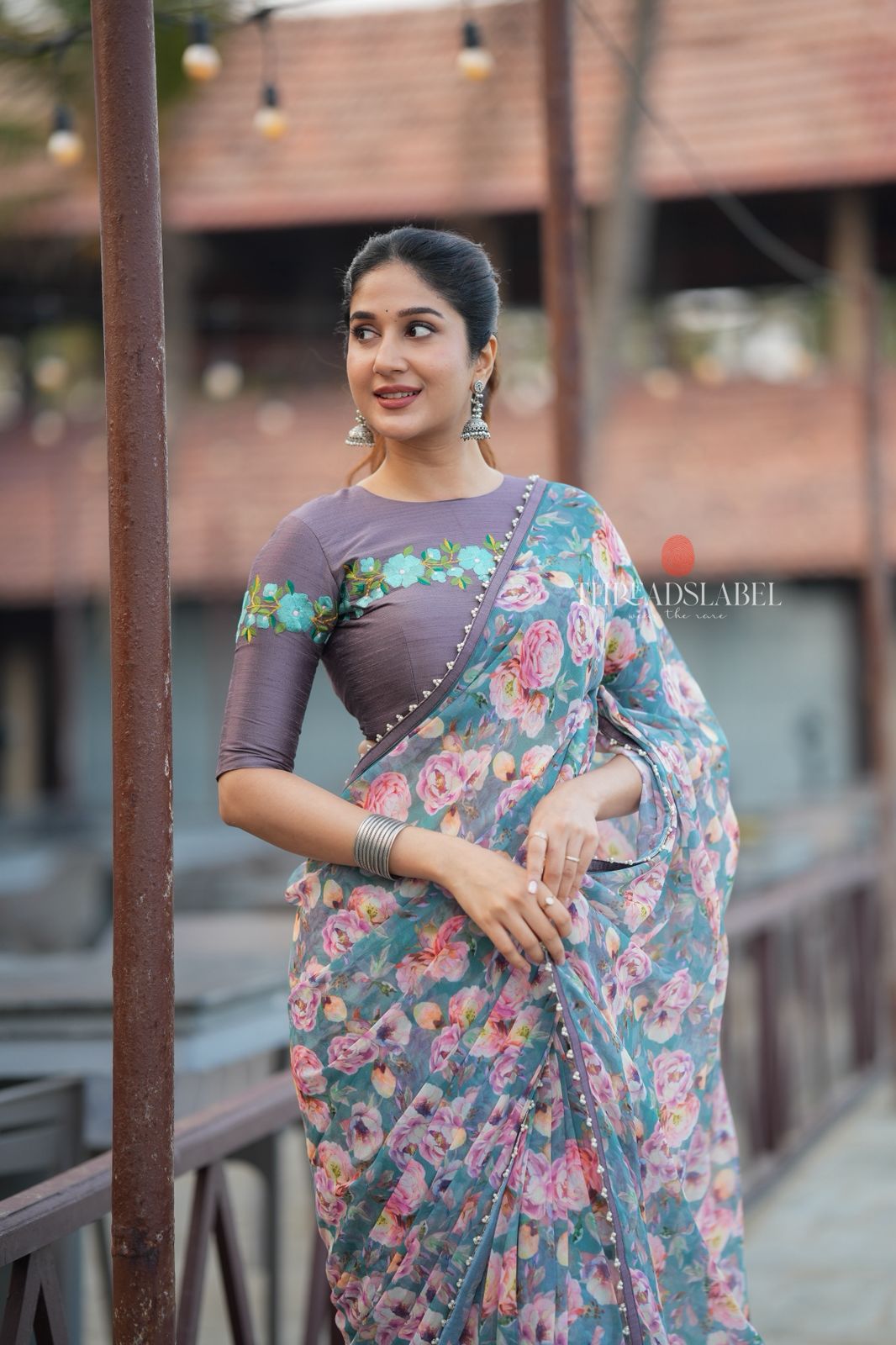 Blue floral georgette saree with grey embroidery blouse