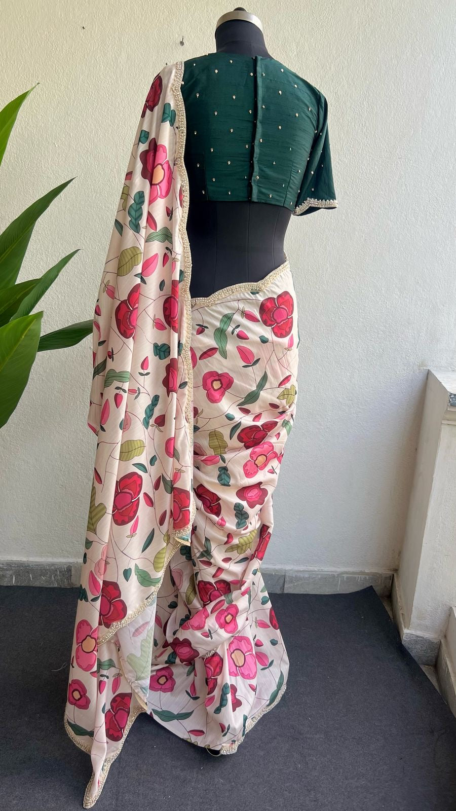 Half white floral kossa saree with green hand worked blouse