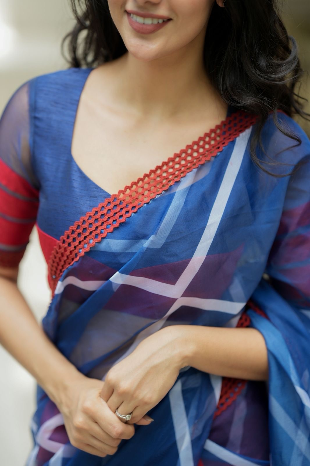 Blue maroon organza saree with patterned blouse