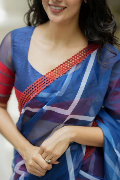 Blue maroon organza saree with patterned blouse