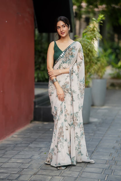 Half white chiffon floral saree with hand work blouse