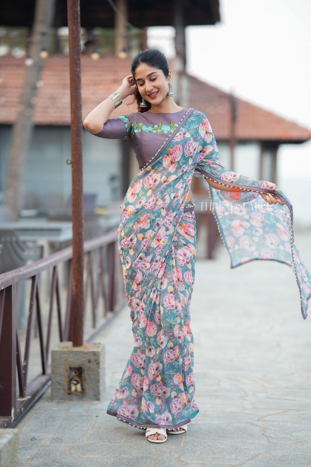 Blue floral georgette saree with grey embroidery blouse