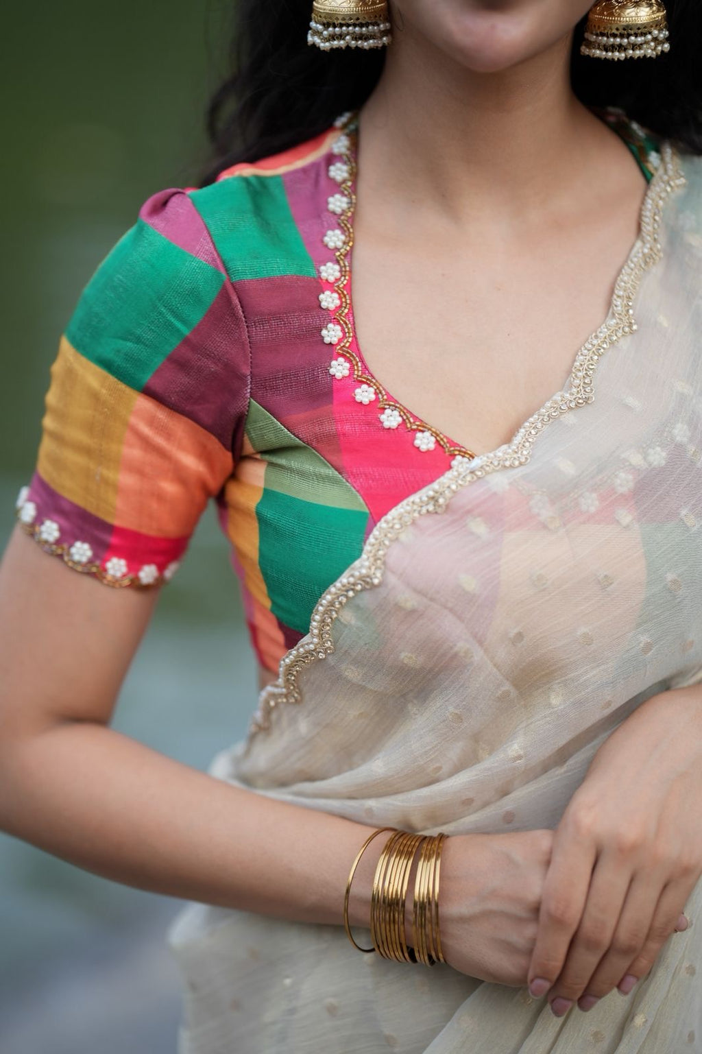 Beige georgette tissue saree with multi hand work blouse
