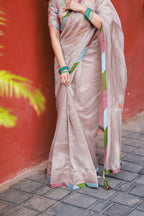 Dusty silver tissue saree with pearl hand work blouse