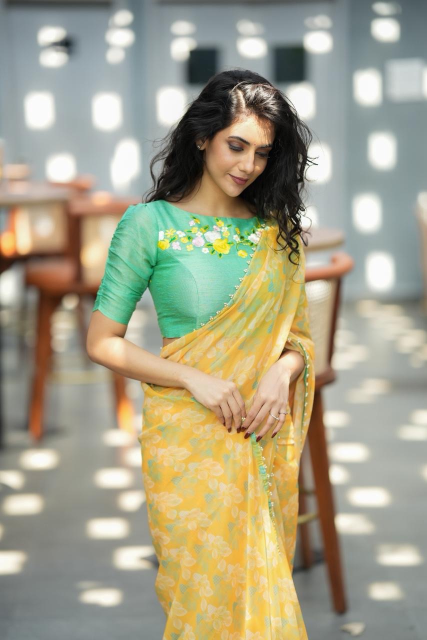 Green tissue floral hand work blouse (only blouse)