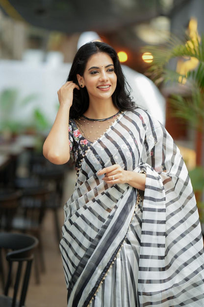 Black & white stripe organza saree with hand work blouse