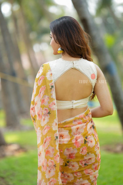 Fenugreek chiffon floral saree with linen mirror blouse
