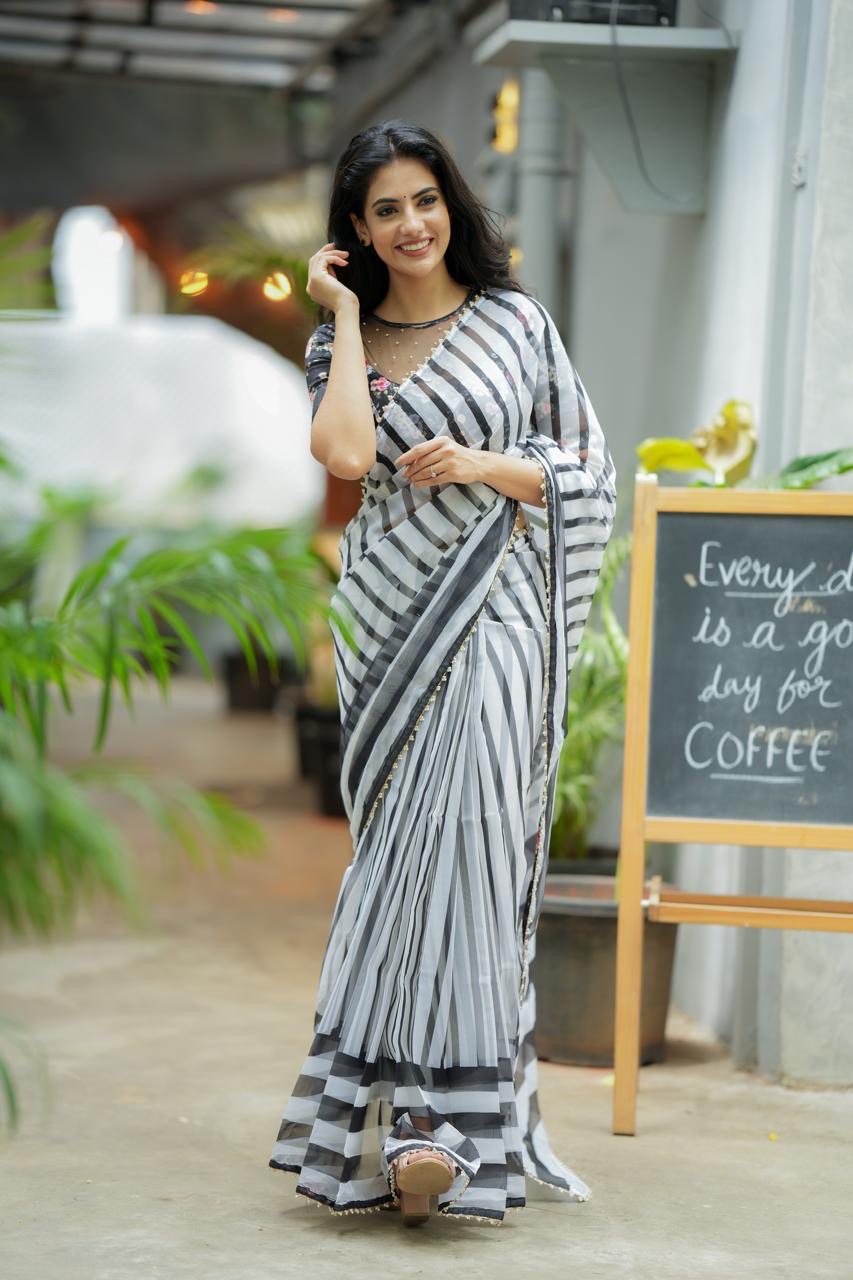 Black & white stripe organza saree with hand work blouse