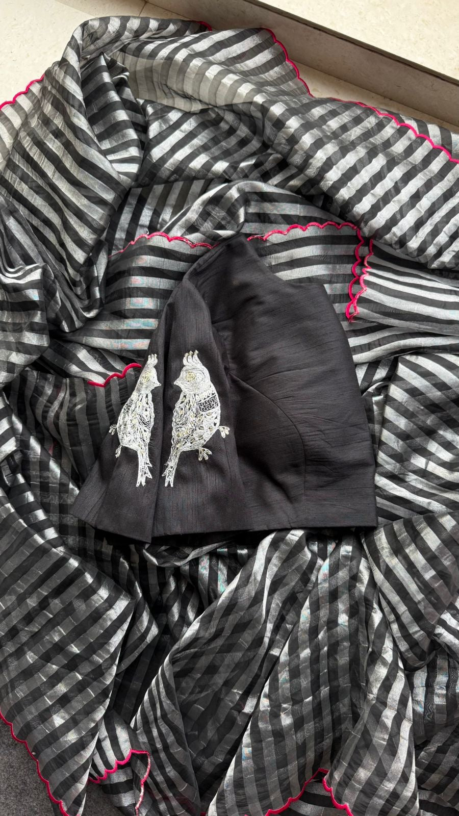 Black & silver stripped tissue saree with bird work blouse