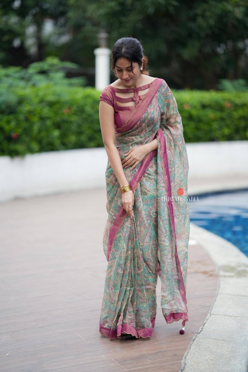 Jade green viscose jute saree with pink tissue blouse