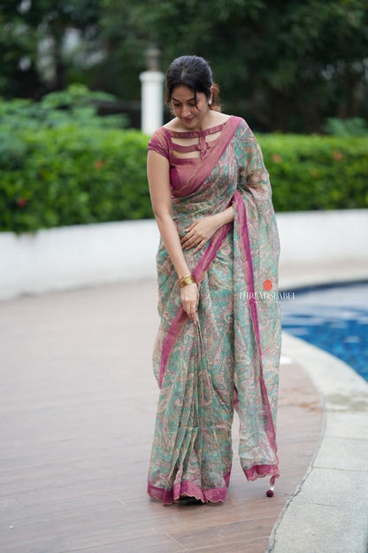 Jade green viscose jute saree with pink tissue blouse