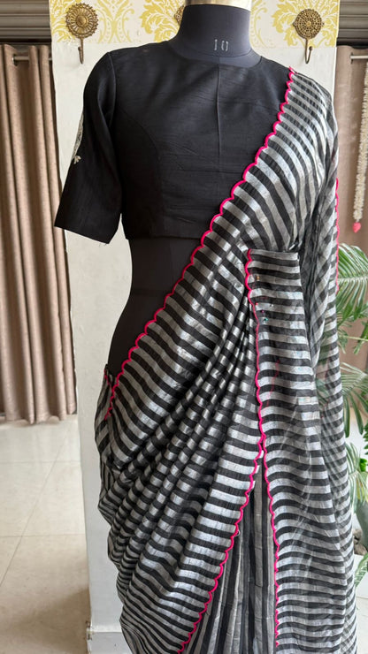 Black & silver stripped tissue saree with bird work blouse