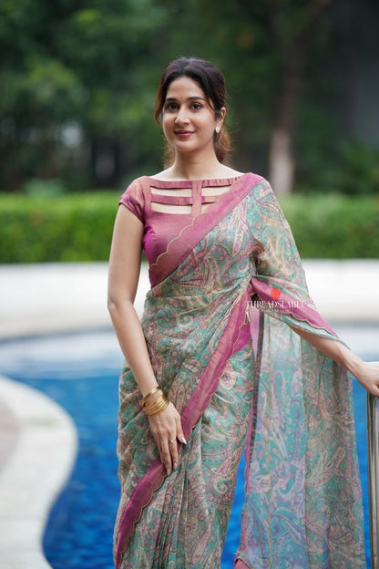 Jade green viscose jute saree with pink tissue blouse
