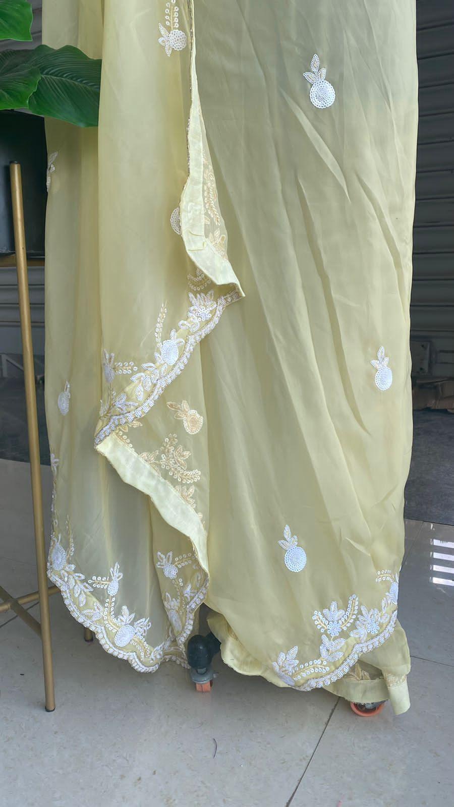 Banana yellow organza saree with silk embroidery blouse
