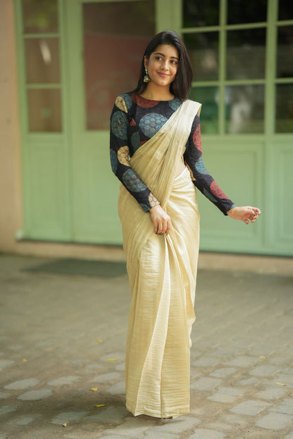 Cream malai chanderi saree with Ajrak handblock print blouse