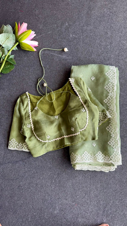 Light green tissue saree with tissue embroidery blouse