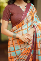 Multi checked kota saree with brown embroidery blouse