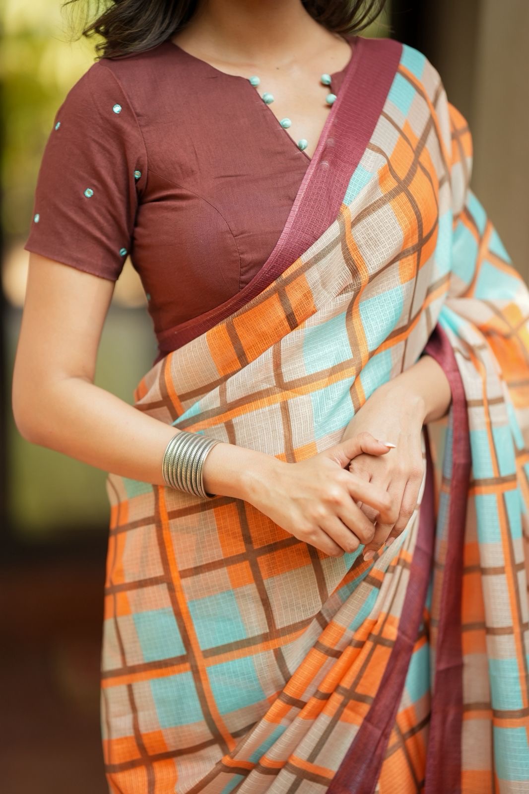Multi checked kota saree with brown embroidery blouse