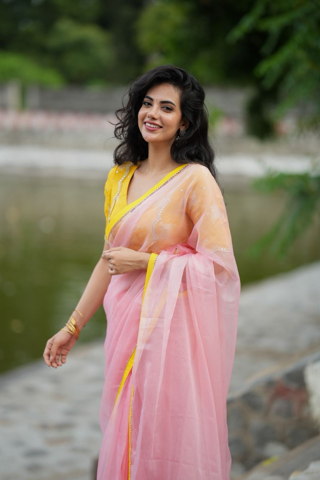 Peach organza saree with yellow hand work blouse