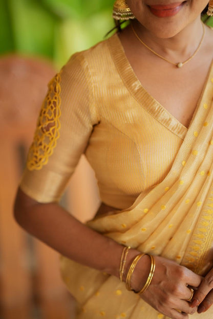 Gold kota doria saree with hand work blouse