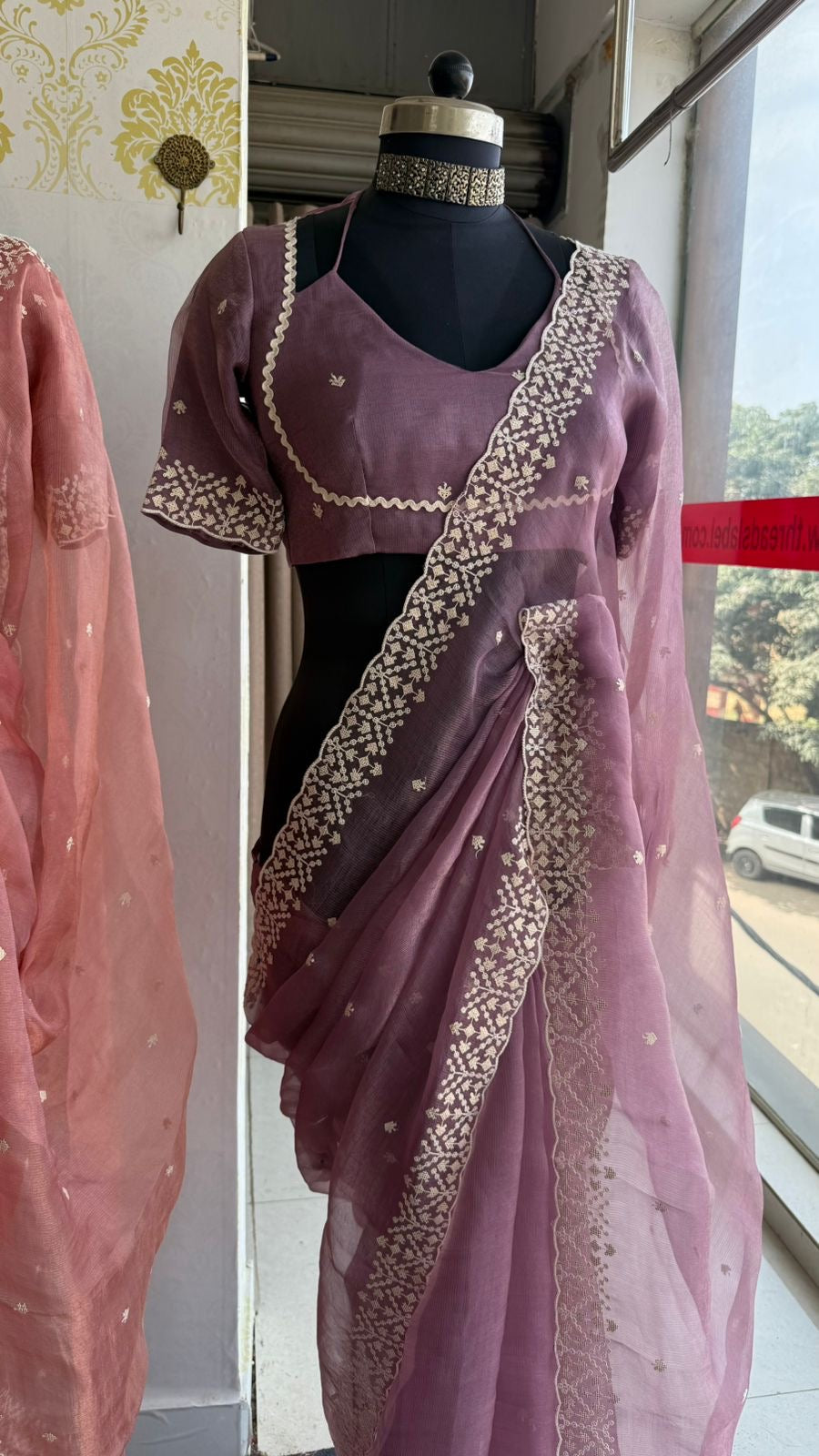 Lavender tissue saree with tissue embroidery blouse