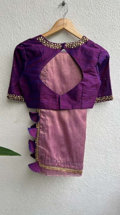 Pink tissue saree with purple hand work blouse