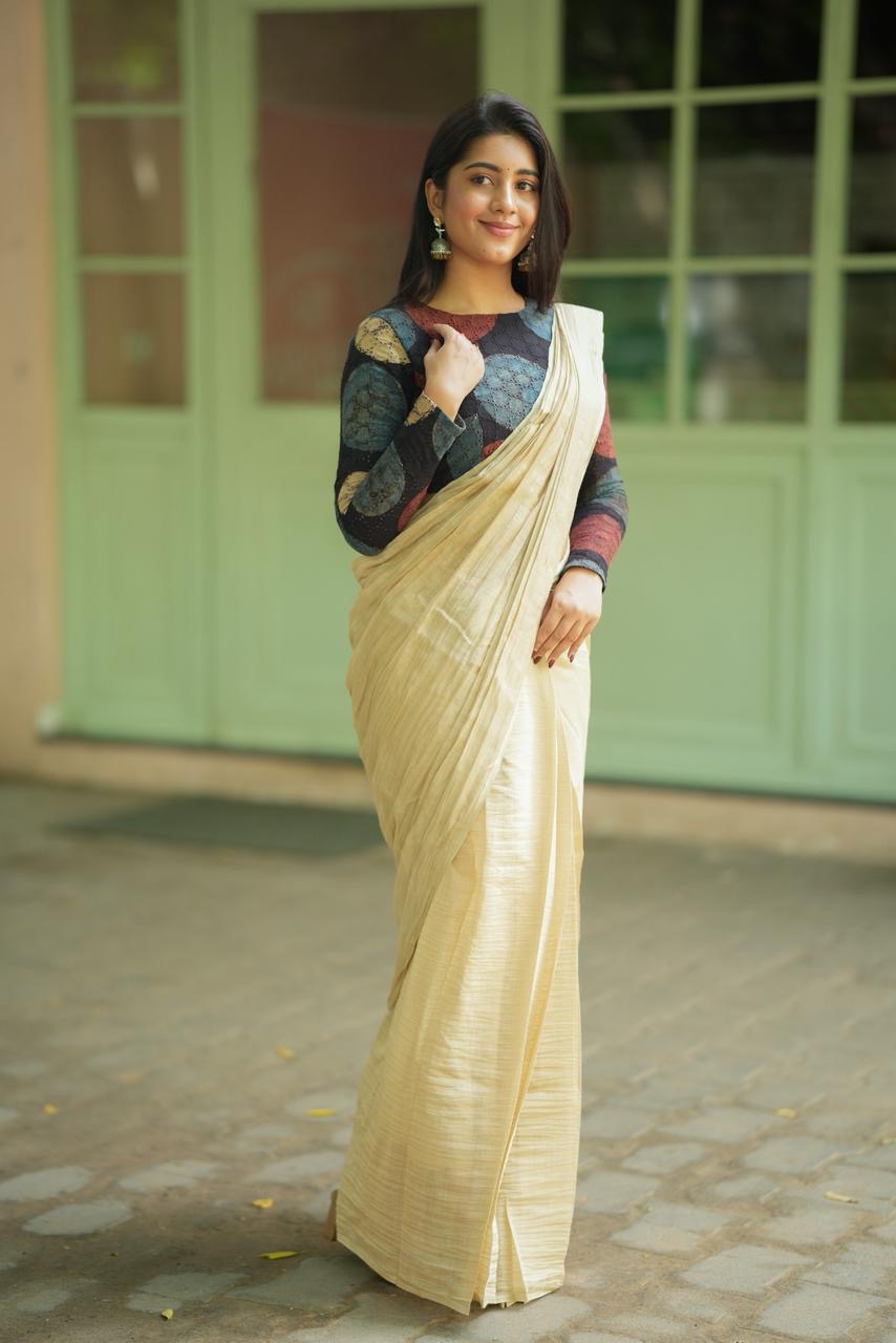 Cream malai chanderi saree with Ajrak handblock print blouse