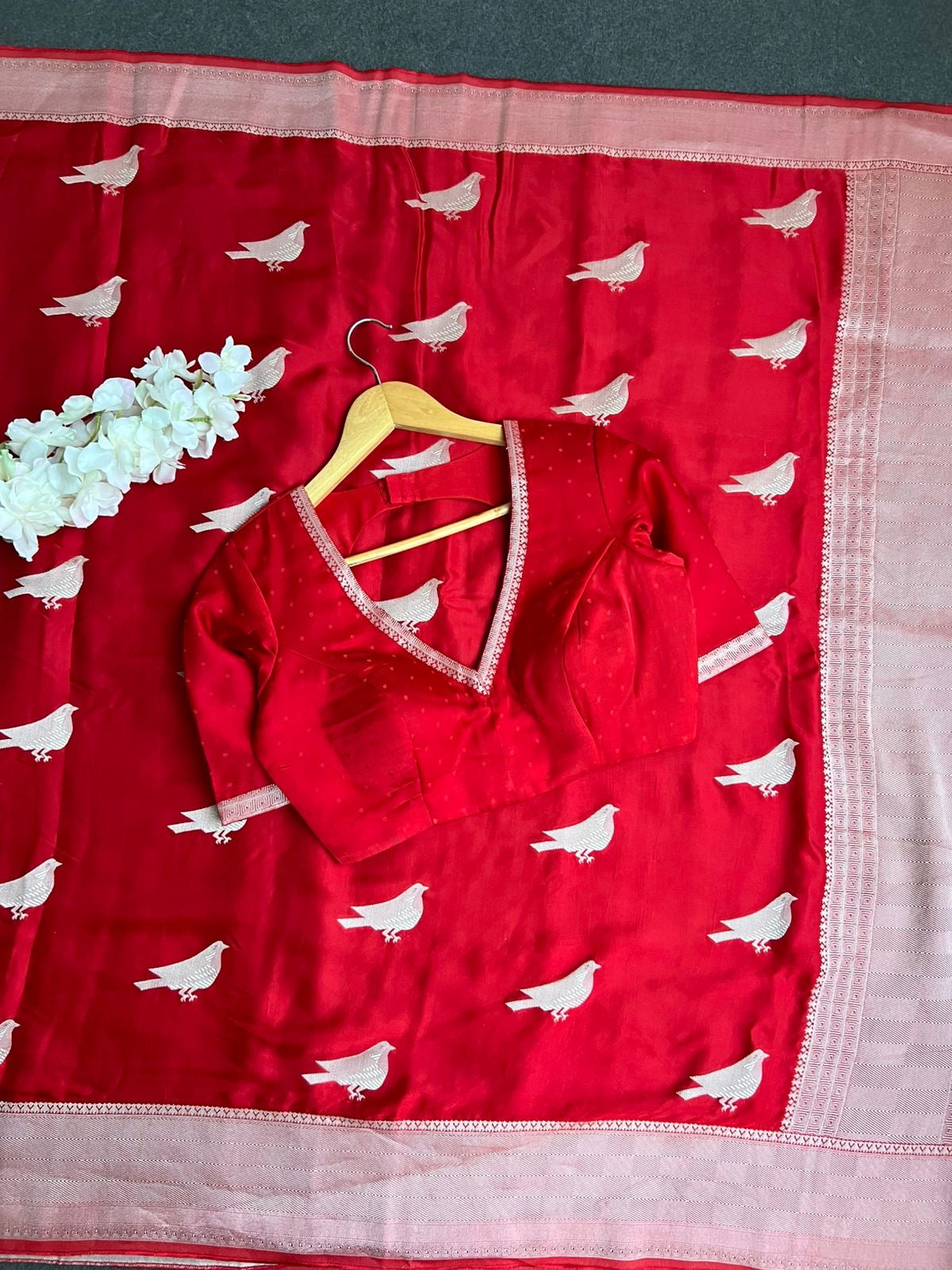 Red malai silk saree with zari work blouse