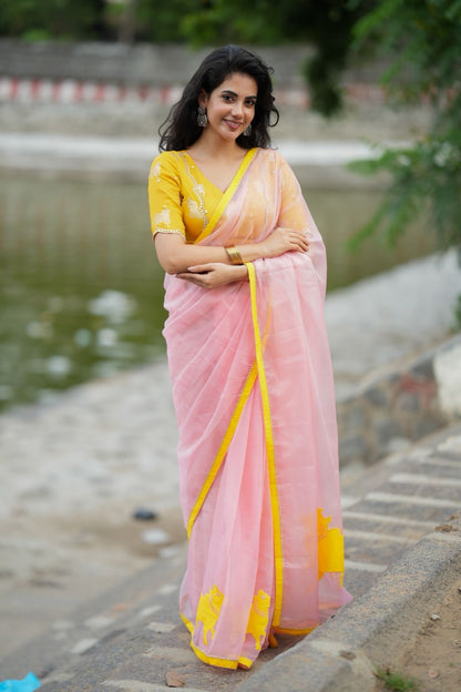 Peach organza saree with yellow hand work blouse