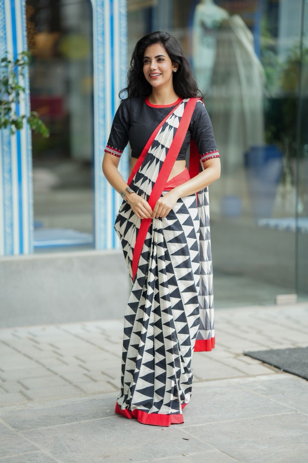 Black & white triangle saree with black hand work blouse