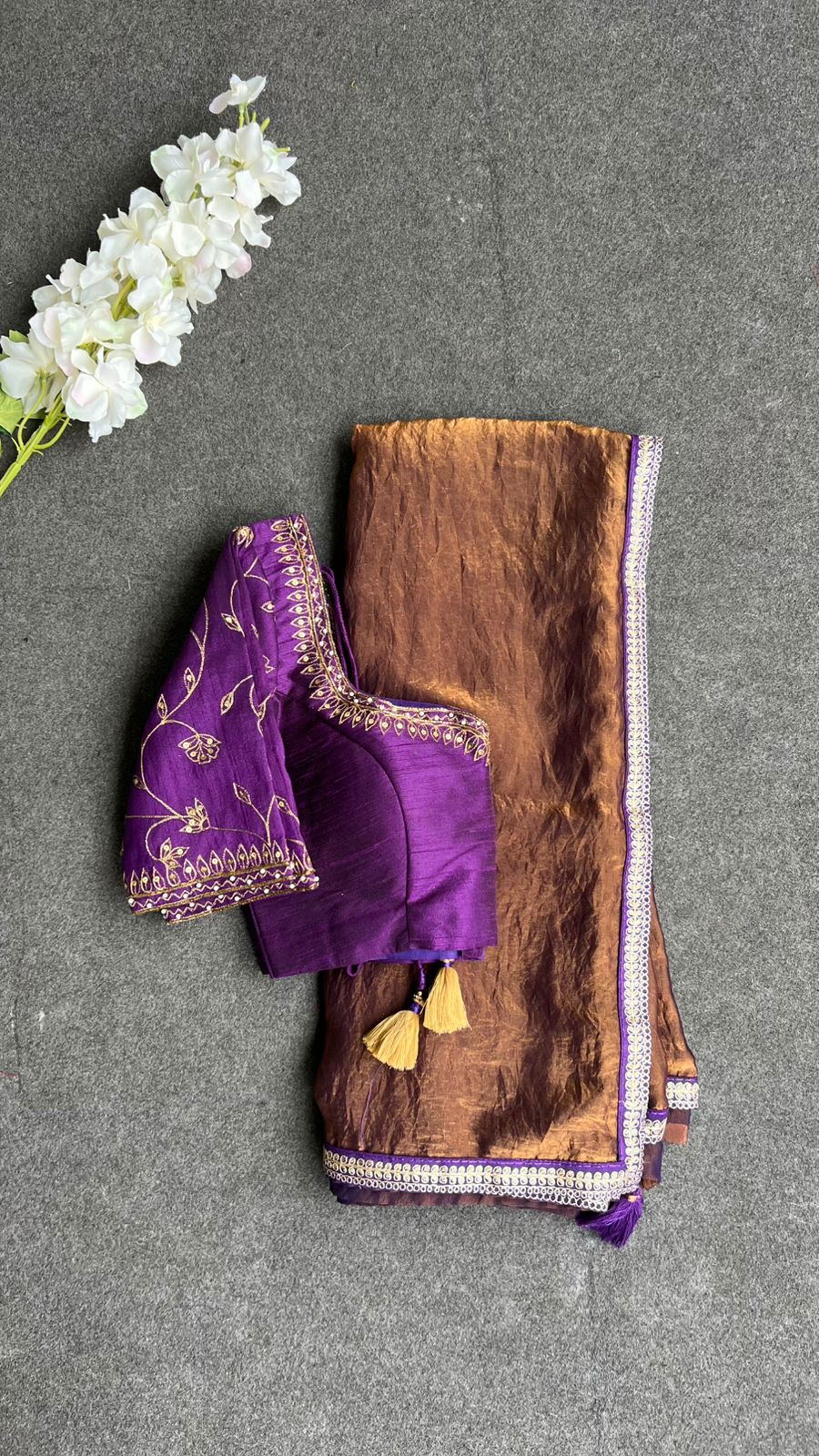 Coffee tissue saree with purple heavy hand work blouse