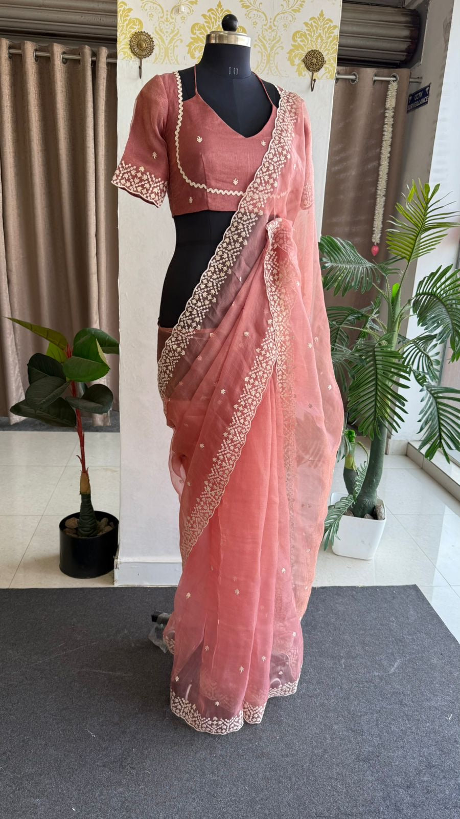 Peach tissue saree with tissue embroidery blouse