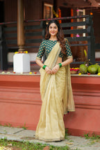Gold tissue saree with green hand work blouse