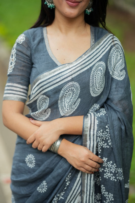 Grey linen floral saree with hand work blouse