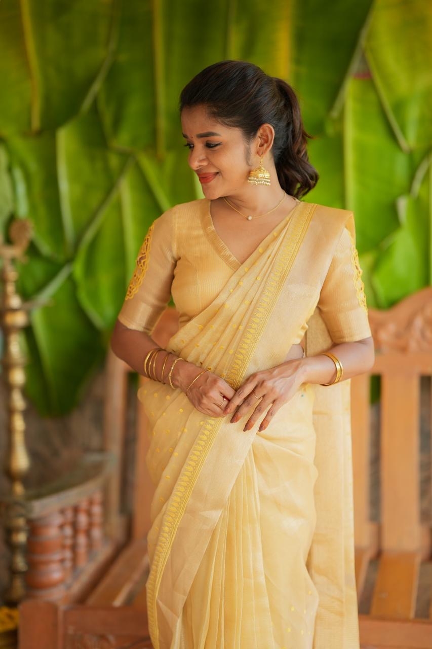Gold kota doria saree with hand work blouse