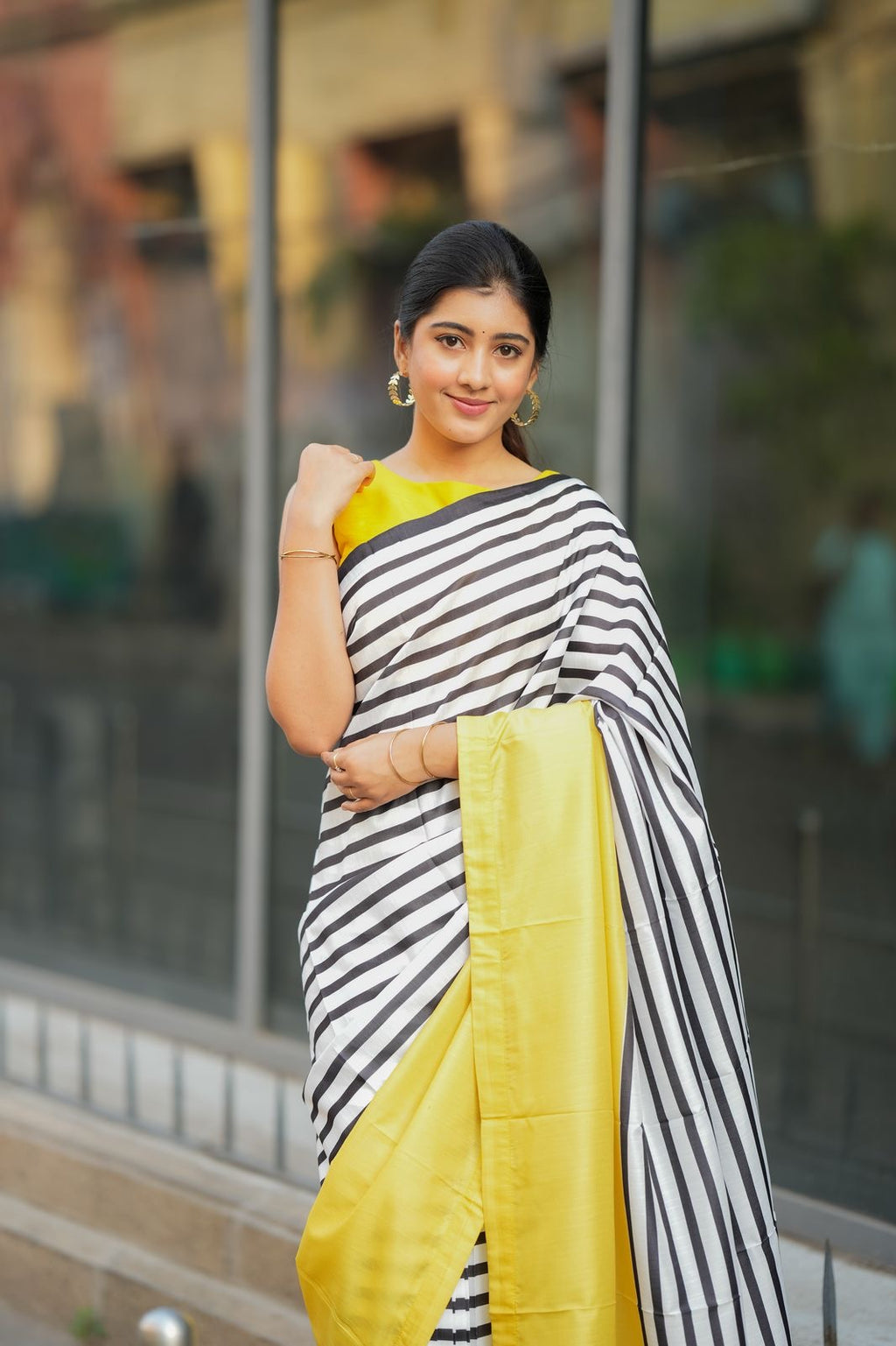 Black & white striped kossa saree with yellow embroidery blouse