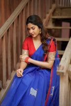 Blue organza cow with red hand work blouse