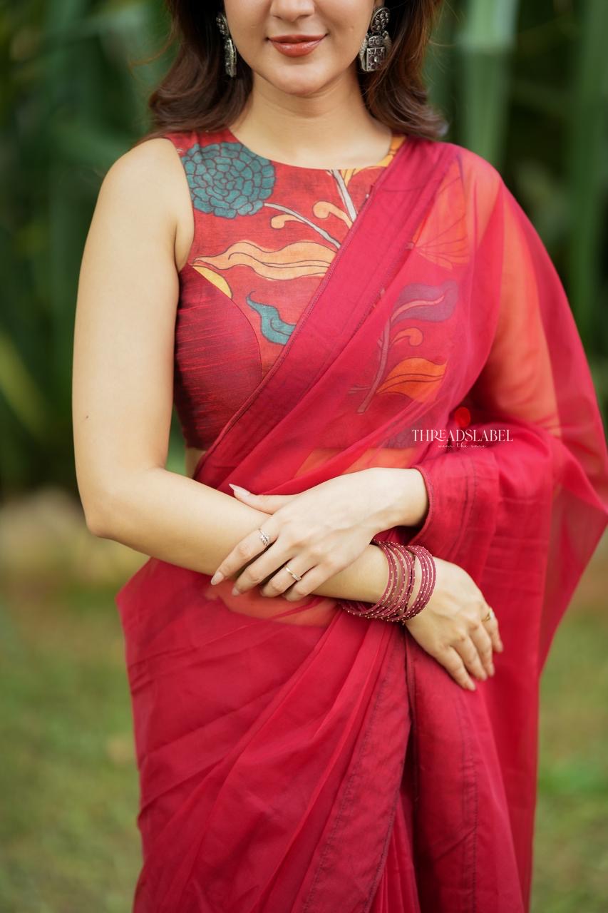 Maroon soft organza saree with kalamkari blouse