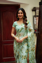 Sea green viscose jute floral saree (only saree)