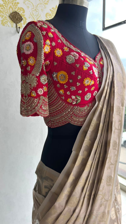 Half white banarasi saree with deep pink silk hand embroidery blouse