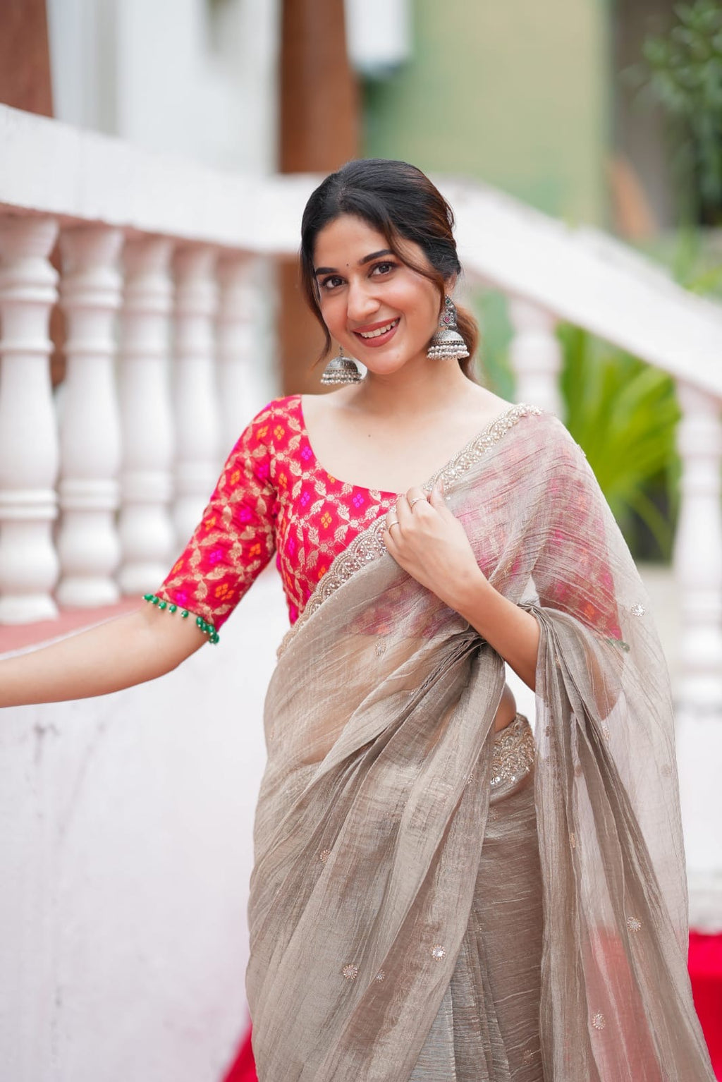 Grey tissue saree with red banarasi blouse