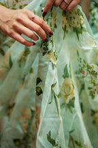 Sea green viscose jute floral saree (only saree)