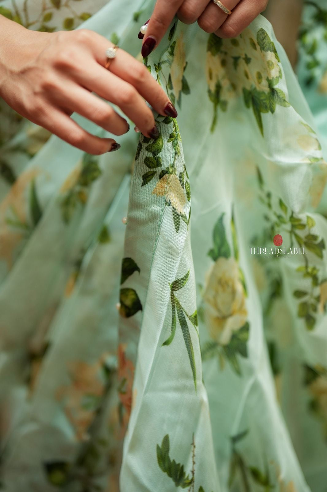 Sea green viscose jute floral saree (only saree)
