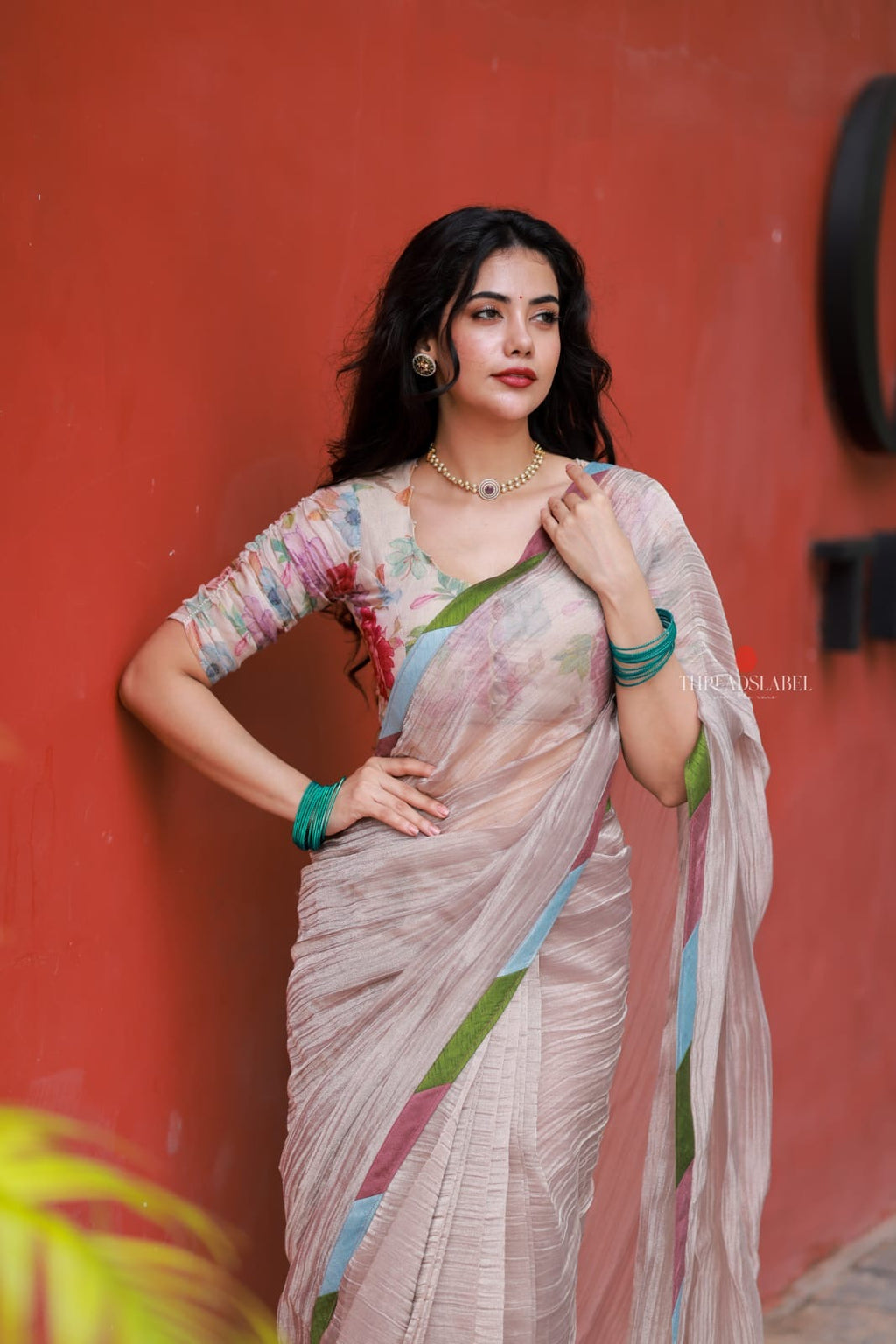 Dusty silver tissue saree with pearl hand work blouse