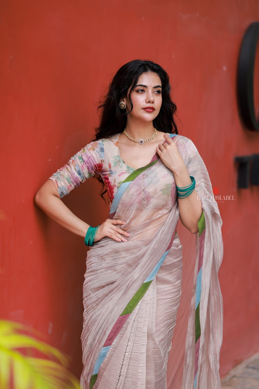 Dusty silver tissue saree with pearl hand work blouse