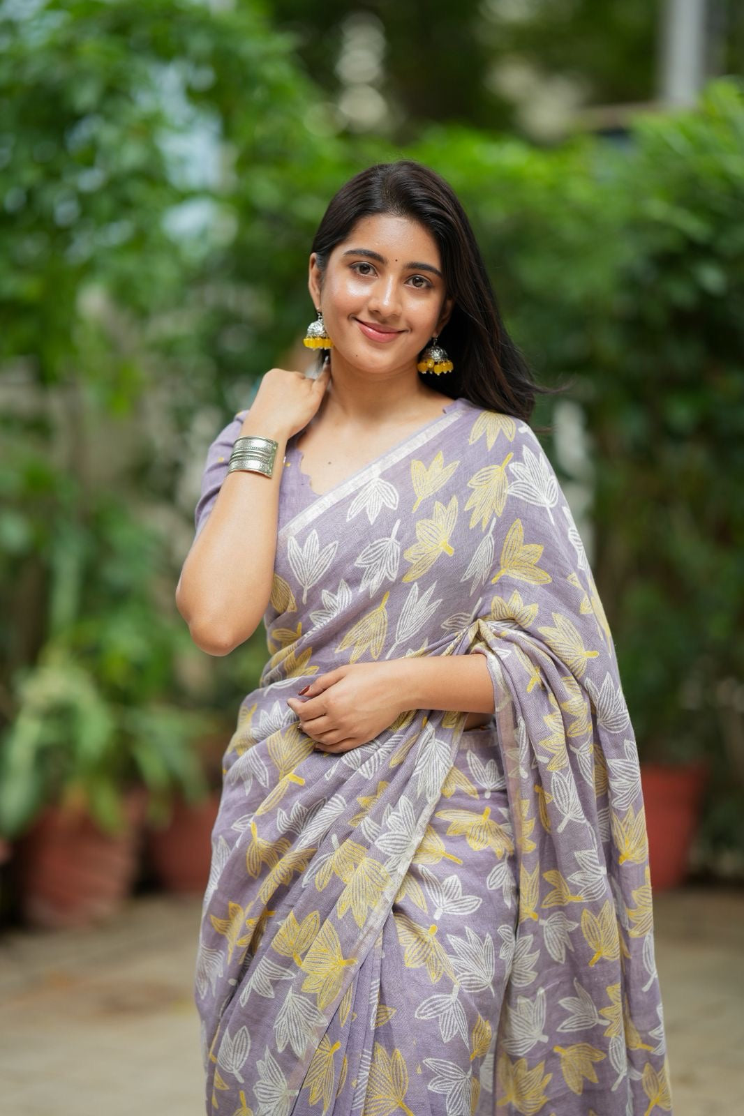 Lavender linen floral saree with hand work blouse