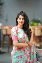 Pista floral organza saree with hand work blouse