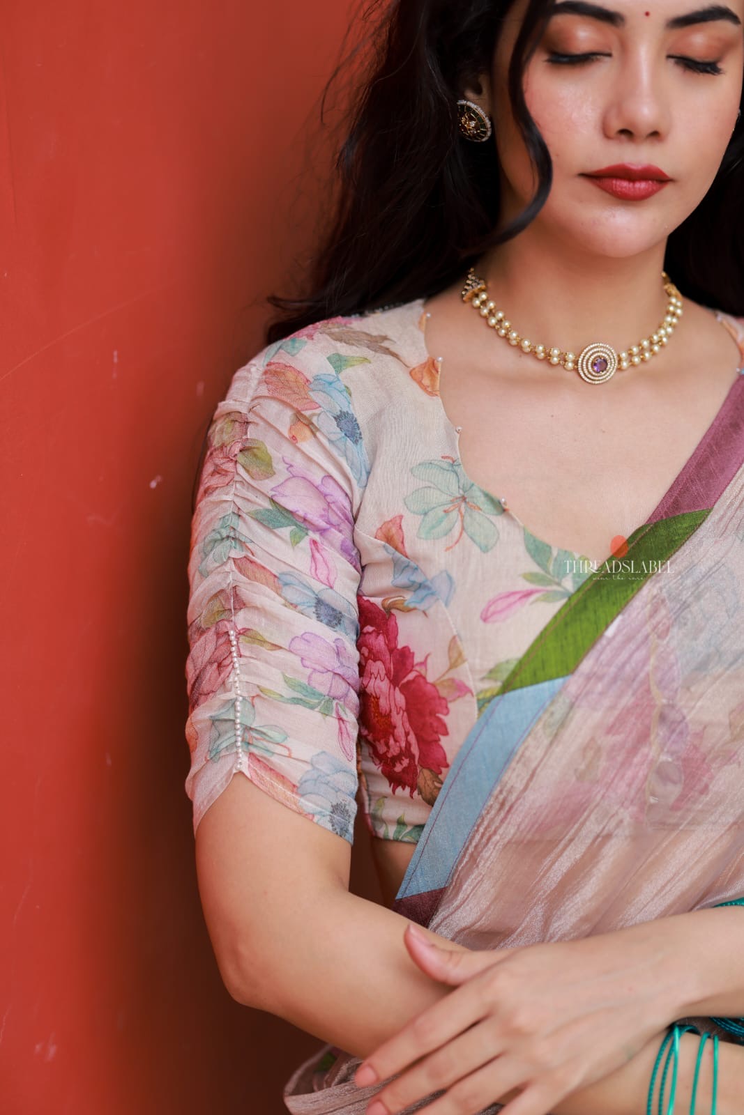 Dusty silver tissue saree with pearl hand work blouse