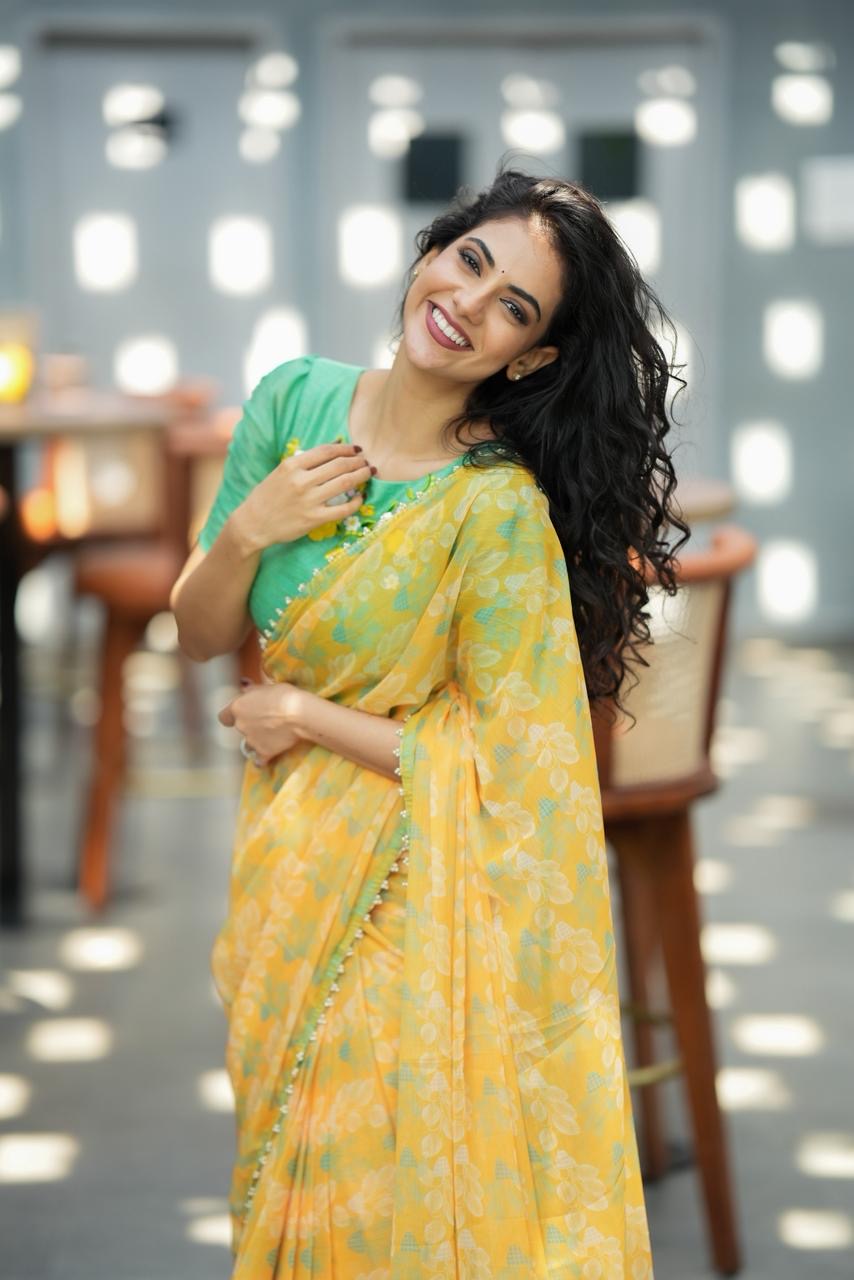 Green tissue floral hand work blouse (only blouse)