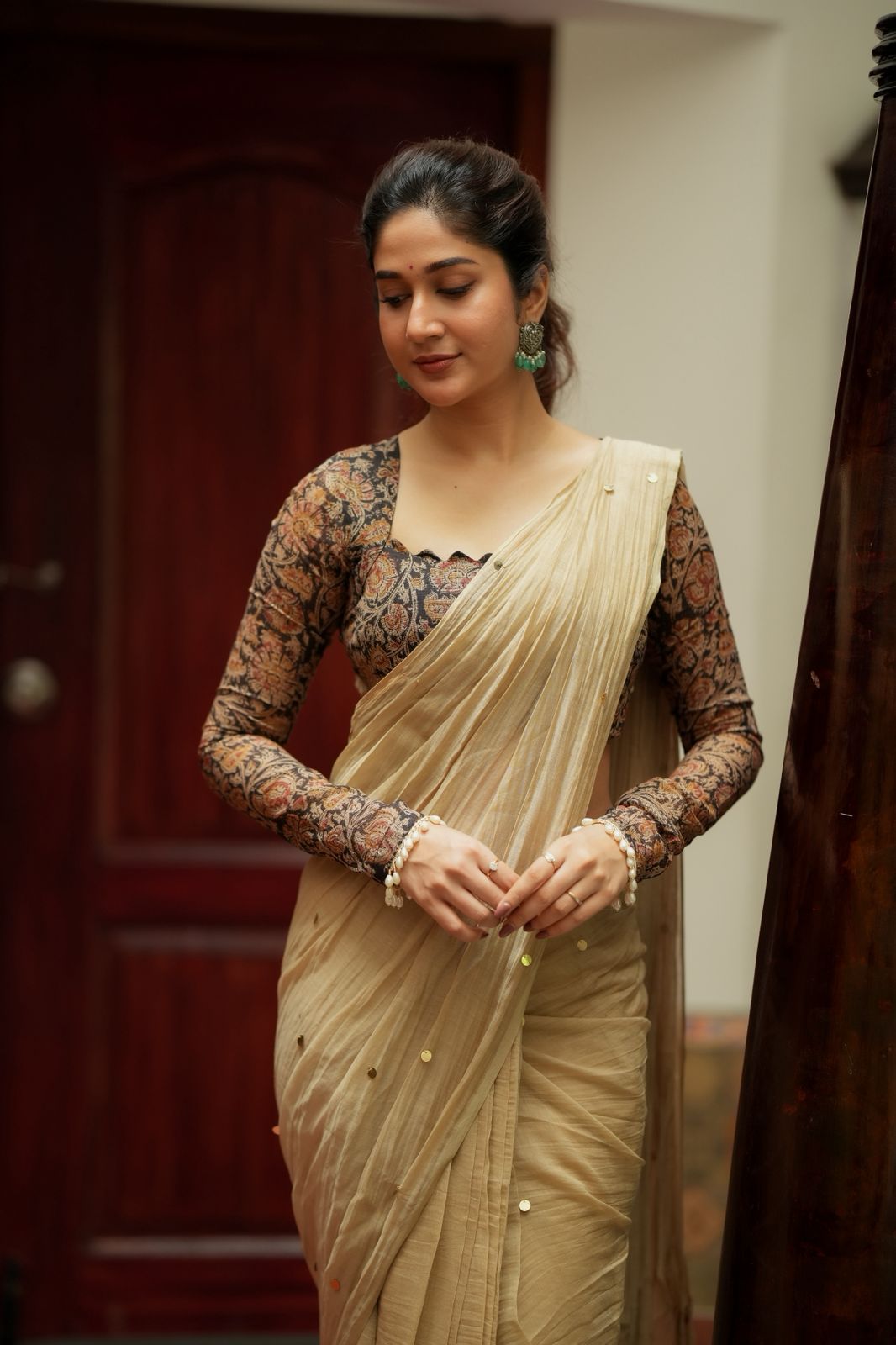 Cream malai chanderi saree with Ajrak print blouse